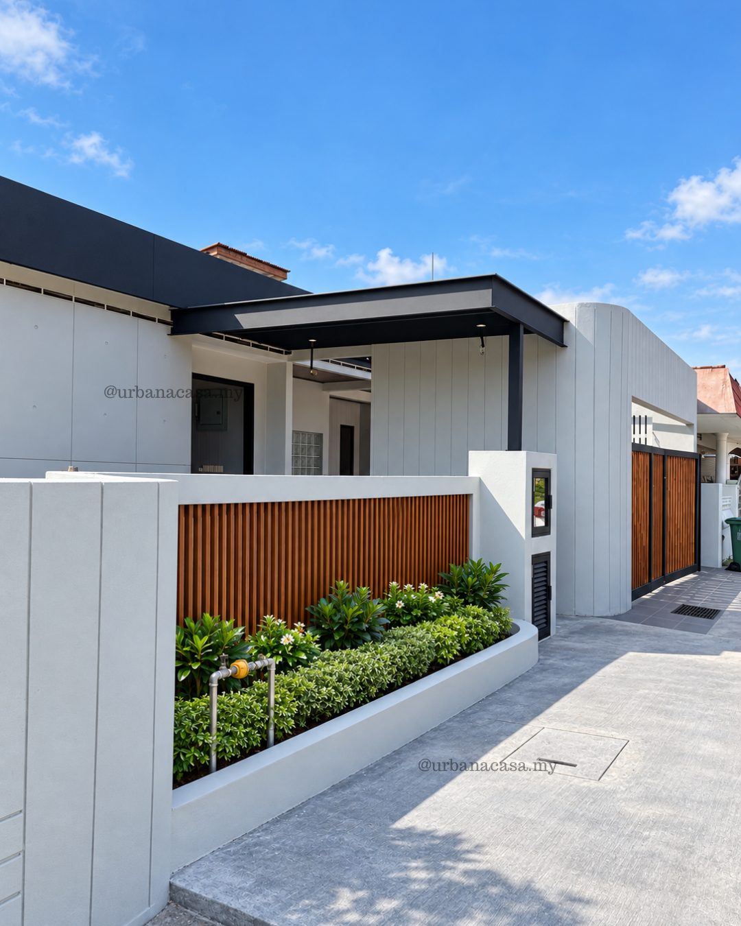 Front garden with timber slat fence panels and planters