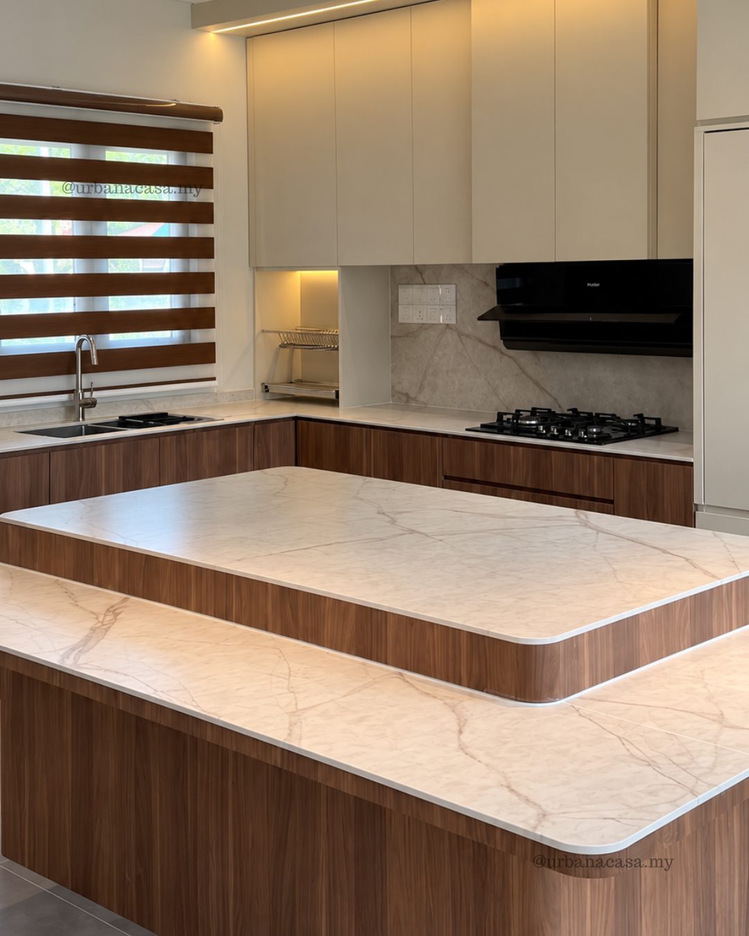 Two-tier kitchen island with marble-look countertop