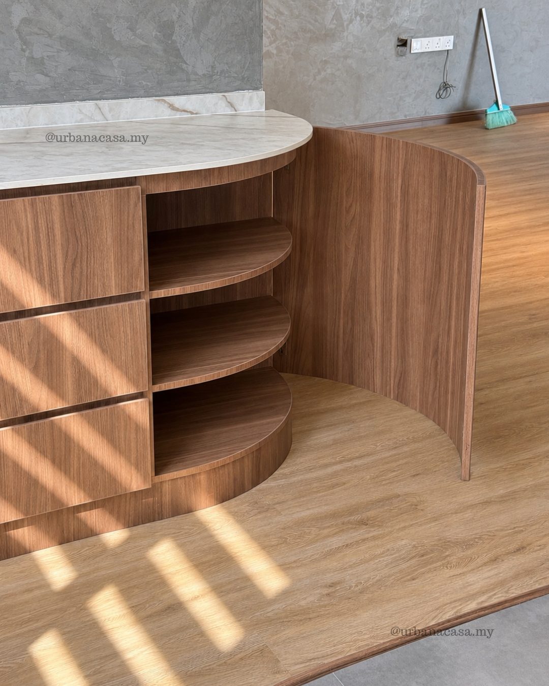 Curved timber base cabinet with open shelving