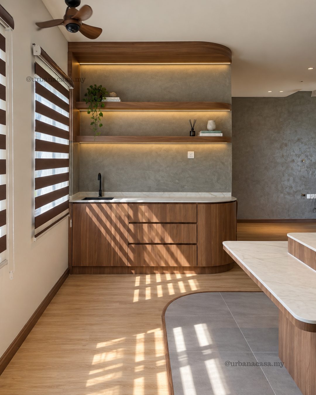 Pantry with floating shelves, curved counter and textured feature wall