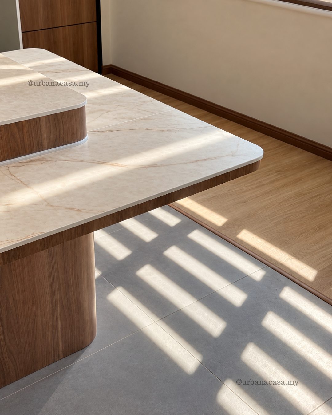 Rounded marble-look island countertop detail